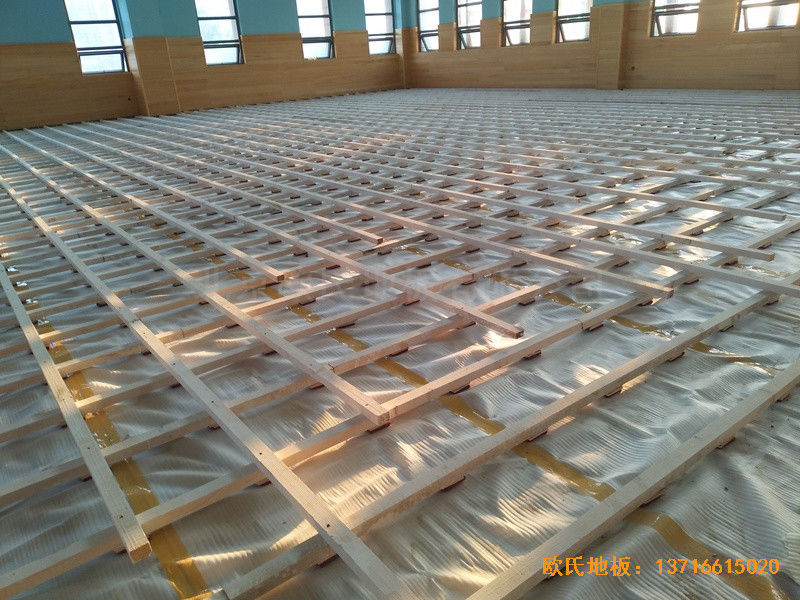 武漢廣阜屯小學(xué)清江錦城分?；@球館運動地板施工案例1