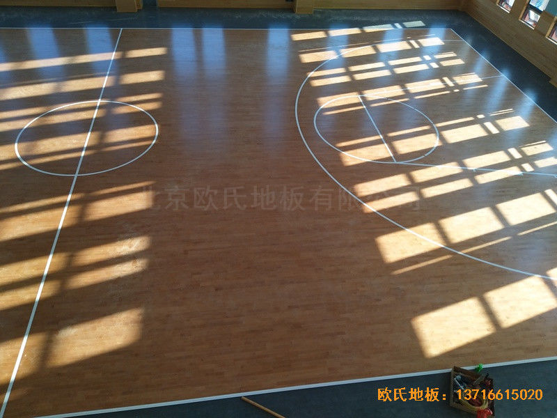 武漢廣阜屯小學(xué)清江錦城分?；@球館運動地板施工案例4